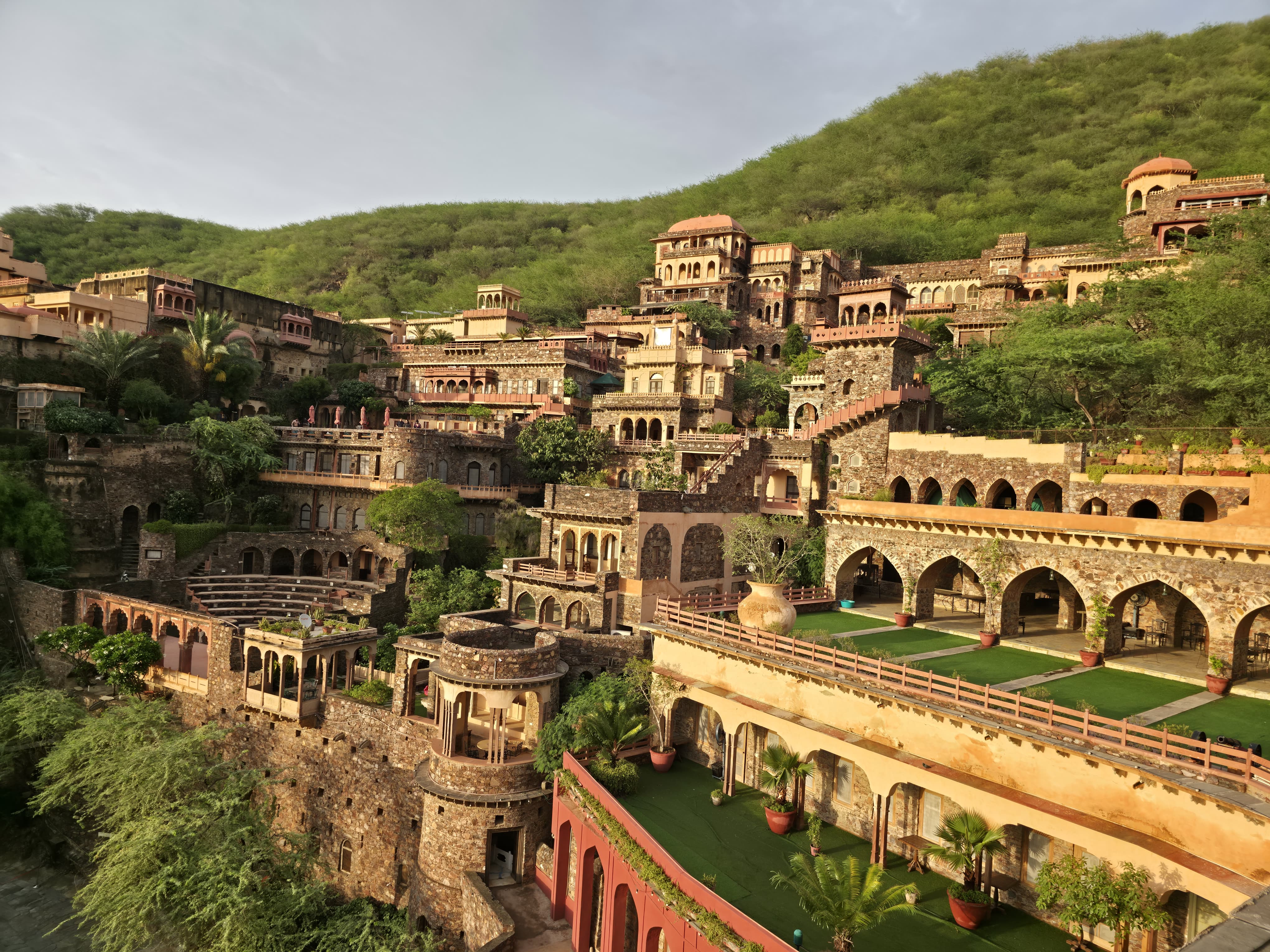 Neemrana Fort Palace terraces at golden hour
